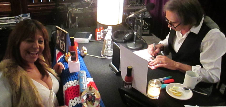 Chris autographing memorabilia for guest  at Kobe Steakhouse & Lounge & Chris Carter's "Breakfast with the Beatles" Sunday Champagne Brunch with 95.5fm KLOS